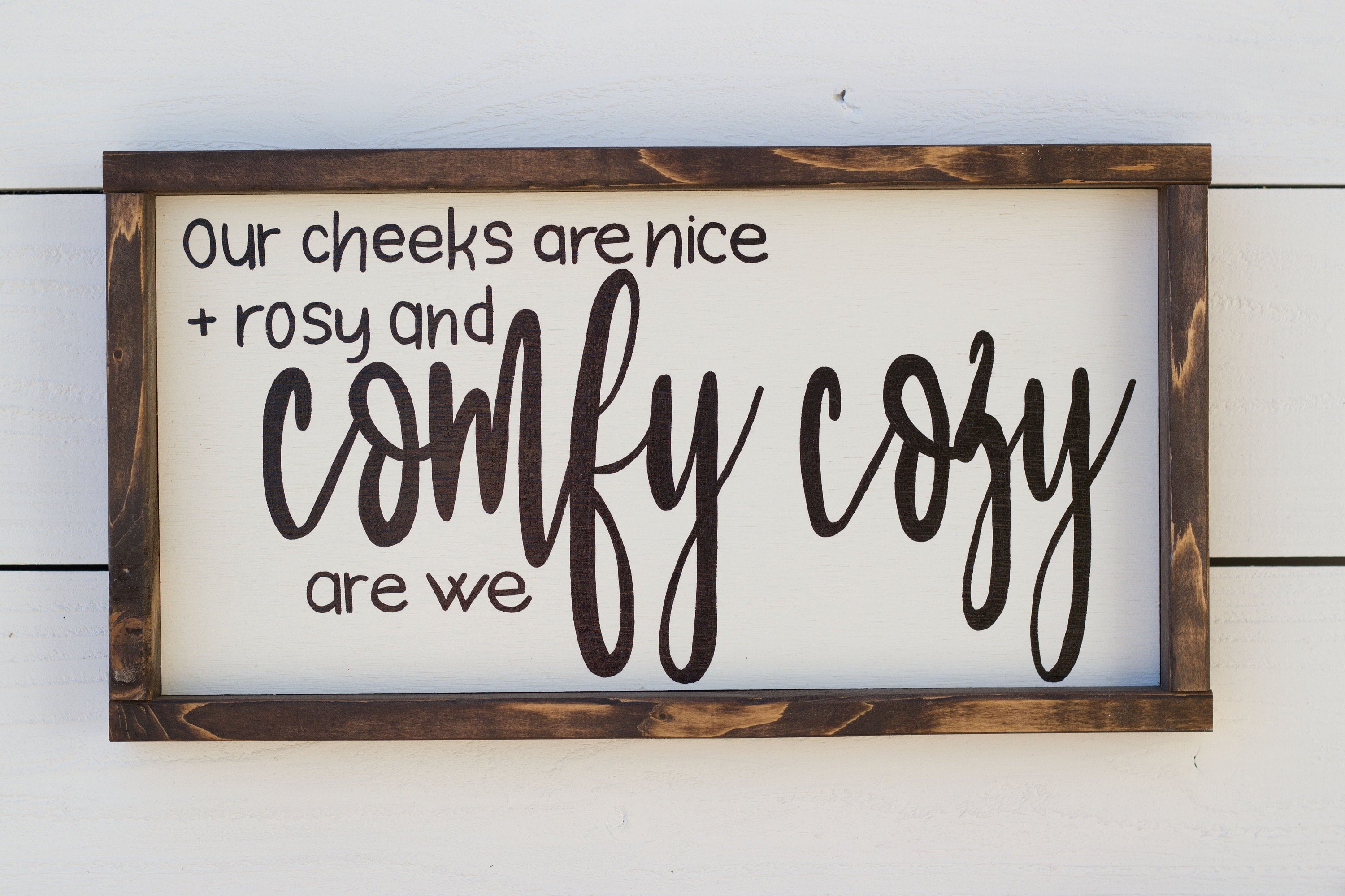 Our cheeks are nice + rosy and comfy cozy are we